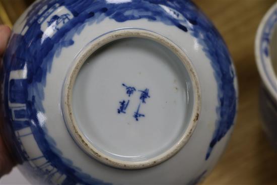 A 19th century Chinese blue and white punch bowl, Diameter 35cm. and three other bowls (a.f.)